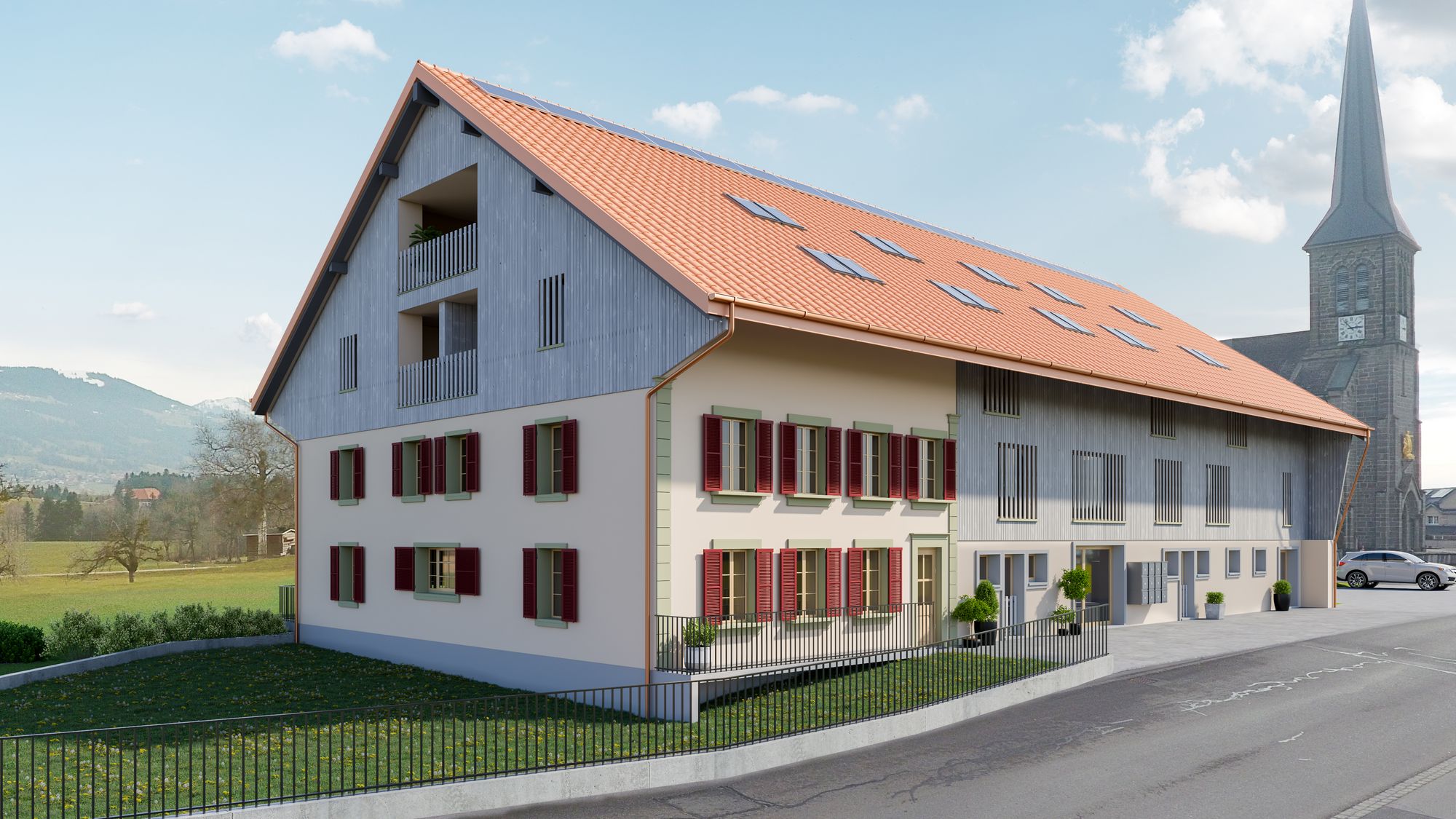 La ferme rénovée vue depuis la Rue de l'Église, avec ses volets rouges et le clocher du village